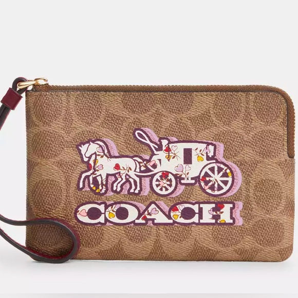 Coach Corner Zip Wristlet In Signature Canvas With Horse And Carriage Print