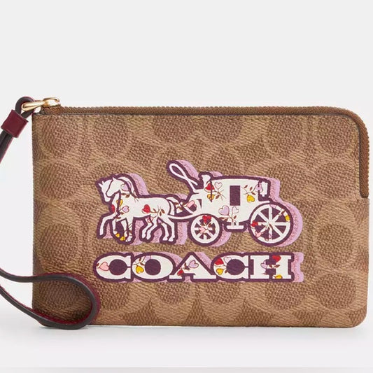Coach Corner Zip Wristlet In Signature Canvas With Horse And Carriage Print